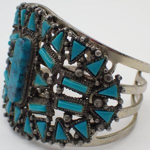 Vintage Faux Turquoise silver tone wide cuff bracelet.